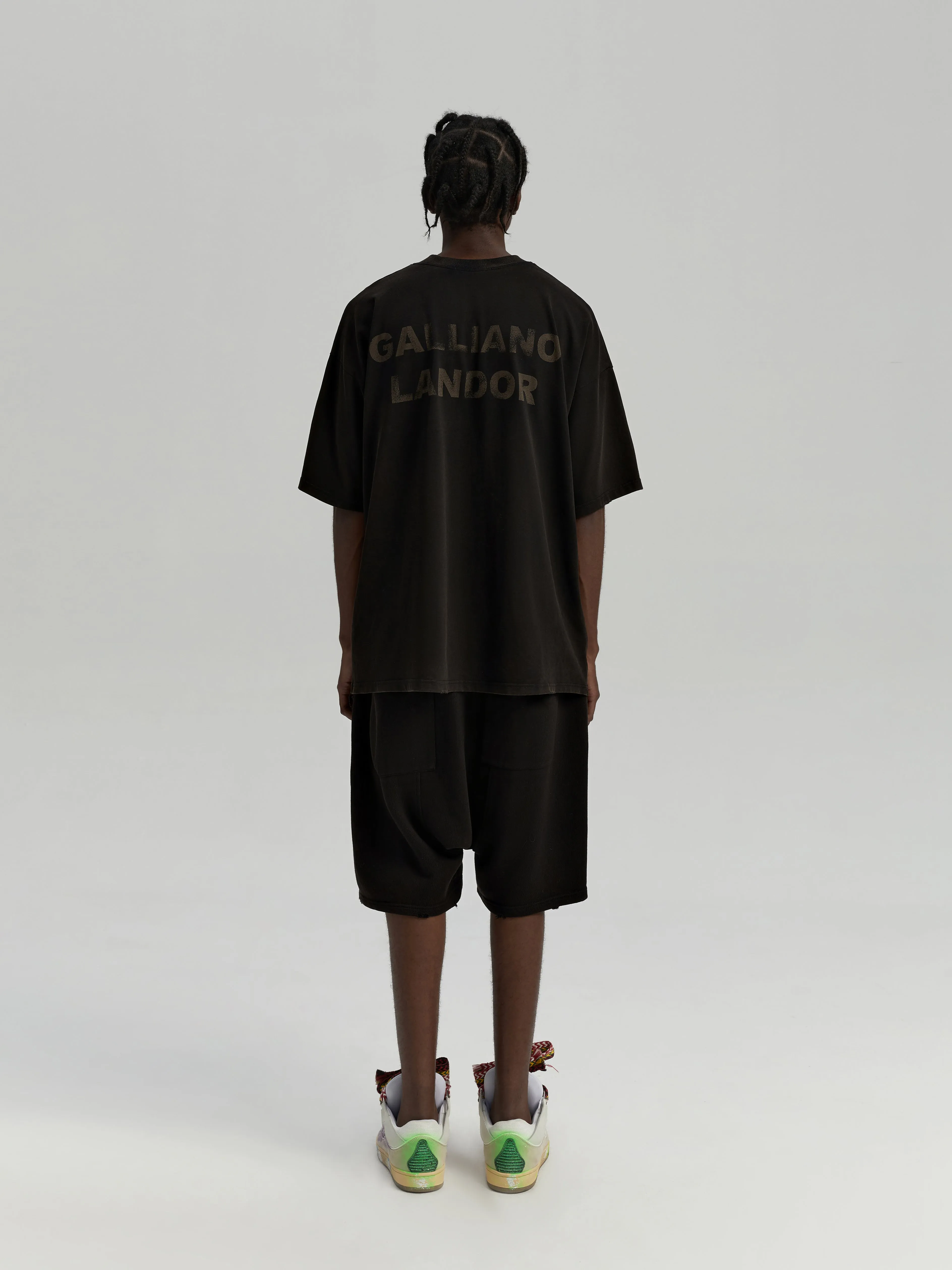 Black antique brass patina logo shorts