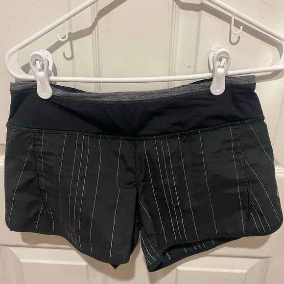 Lululemon women's size 4 speed up shorts black and white white stripped 4&quot;