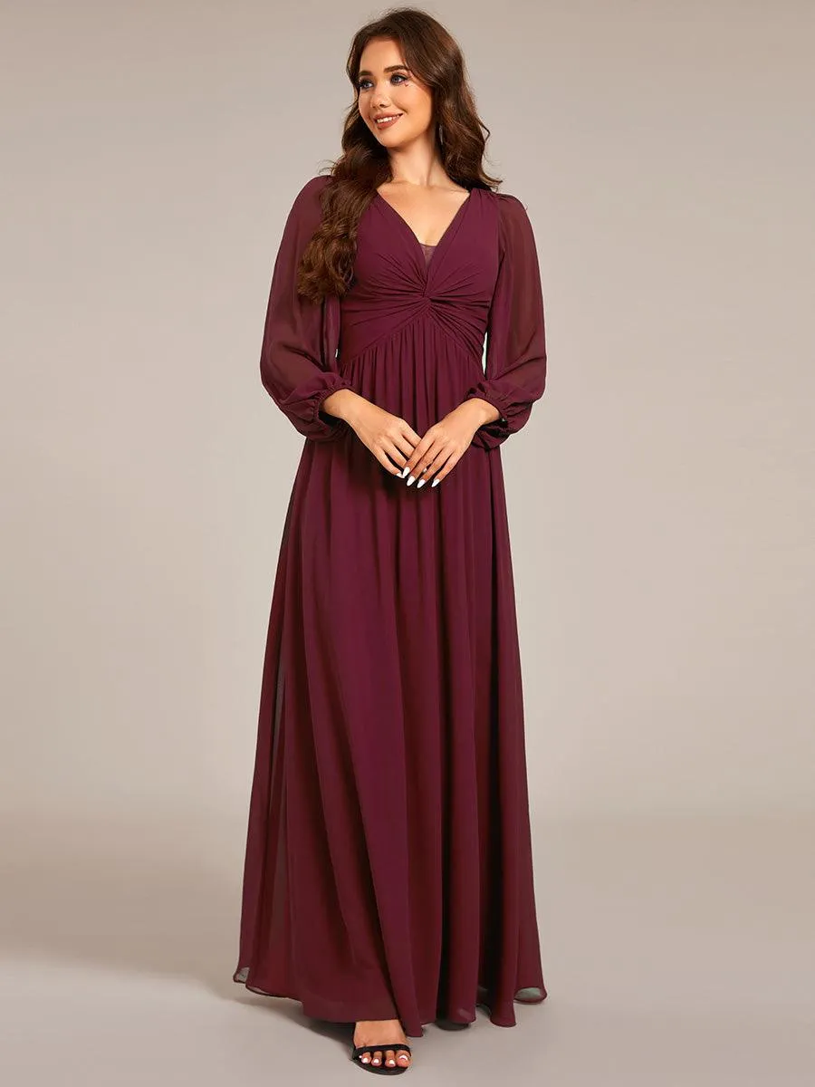 Robe de soirée élégante en mousseline de soie à manches longues et plissée