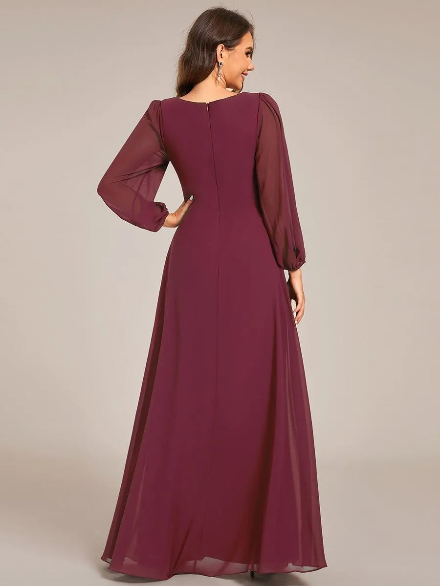Robe de soirée élégante en mousseline de soie à manches longues et plissée