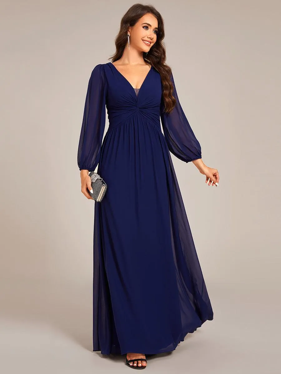 Robe de soirée élégante en mousseline de soie à manches longues et plissée