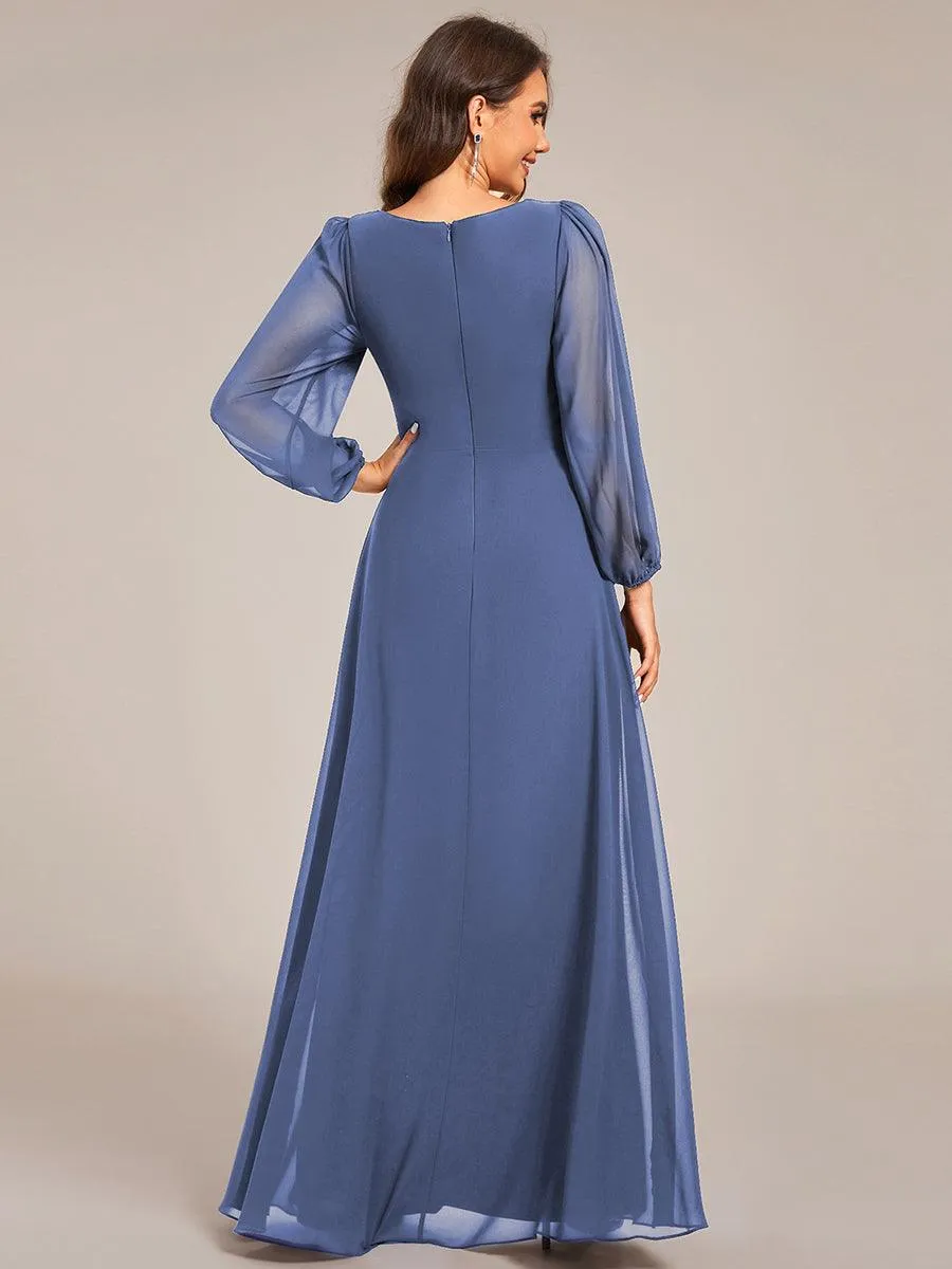 Robe de soirée élégante en mousseline de soie à manches longues et plissée