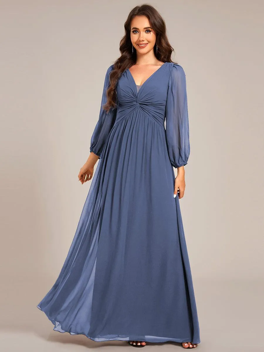 Robe de soirée élégante en mousseline de soie à manches longues et plissée