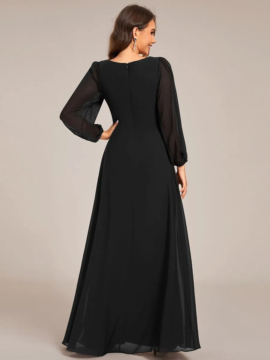 Robe de soirée élégante en mousseline de soie à manches longues et plissée