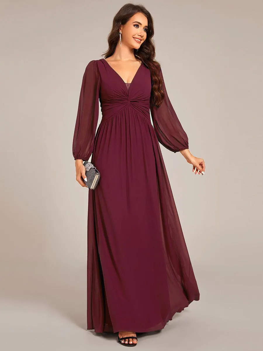 Robe de soirée élégante en mousseline de soie à manches longues et plissée