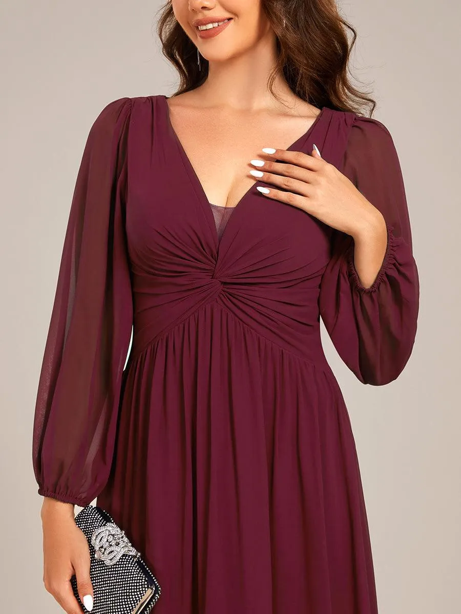 Robe de soirée élégante en mousseline de soie à manches longues et plissée
