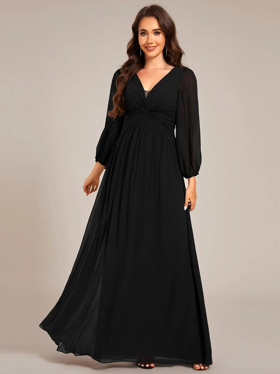 Robe de soirée élégante en mousseline de soie à manches longues et plissée