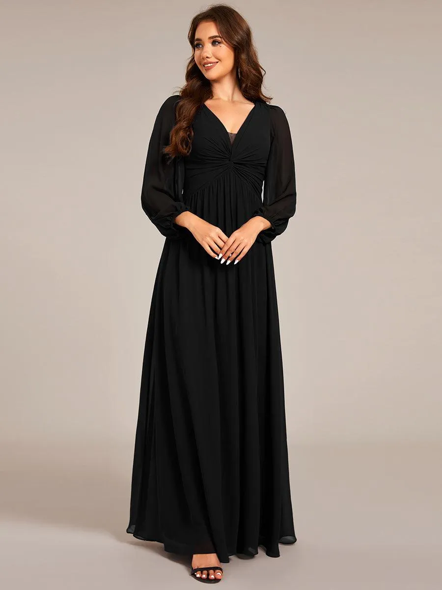 Robe de soirée élégante en mousseline de soie à manches longues et plissée